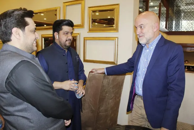 Taimoor Bamazai greeting the Ambassador of Spain